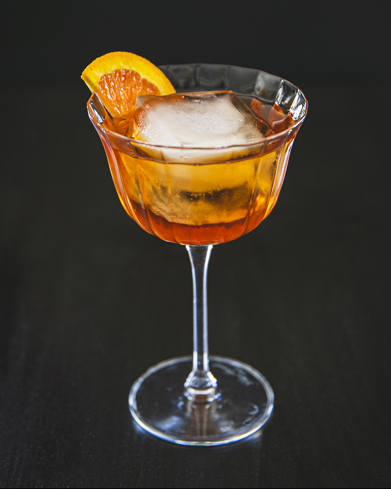 Cocktail M. Dion garni d'un zeste d'orange